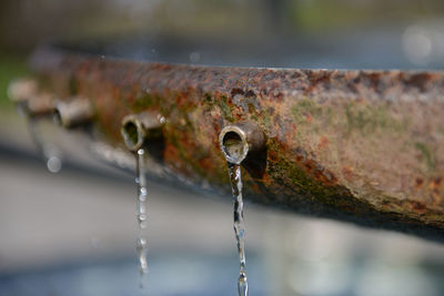 Water drops on rusty metal