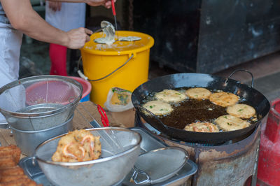 Man preparing food on table