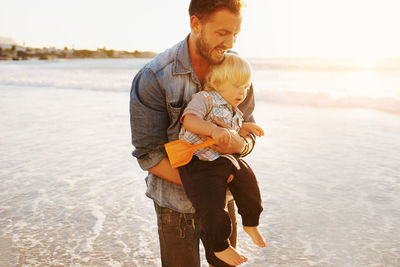 Father with son at beach