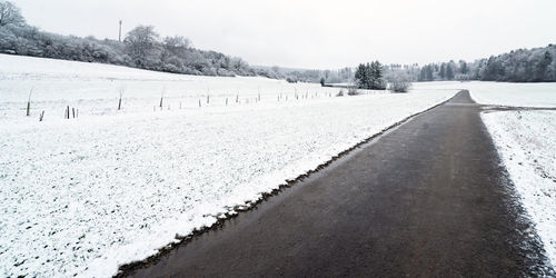 Scenic view of snow covered landscape