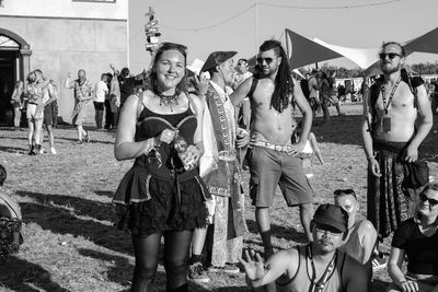 Full length of young women standing outdoors