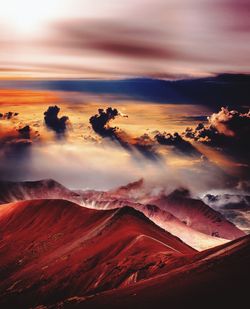 High angle view of land against cloudy sky