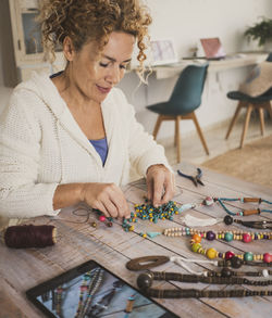 Portrait of young woman working at office