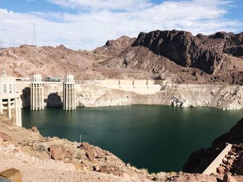 Panoramic view of bridge and mountains against sky