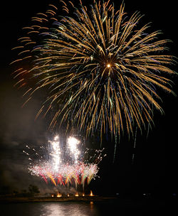 Firework display at night