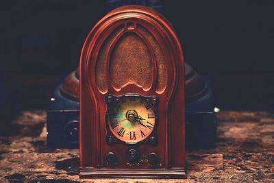 Close-up of clock on wall