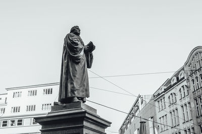 Low angle view of statue against clear sky