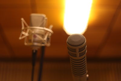 Close-up of microphones in recording studio