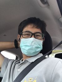 Portrait of man in car