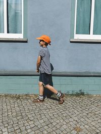 Full length of boy standing outdoors