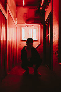 Full length of man standing in building