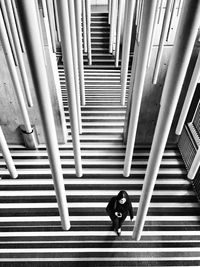 High angle view of people walking on staircase