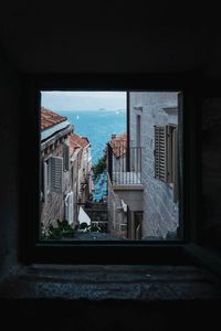 Buildings seen through window