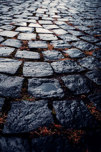 High angle view of stones on footpath