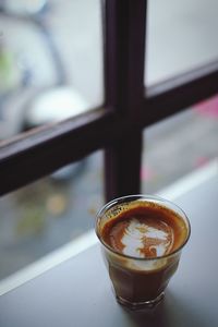 Close-up of coffee cup on table