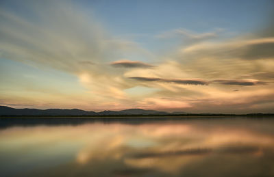 Scenic reflection of clouds in calm sea