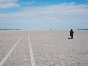 People walking on landscape