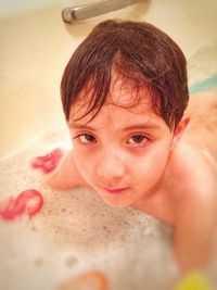 Close-up portrait of shirtless boy