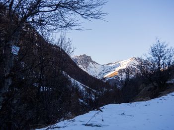 Scenic view of mountains against sky during winter