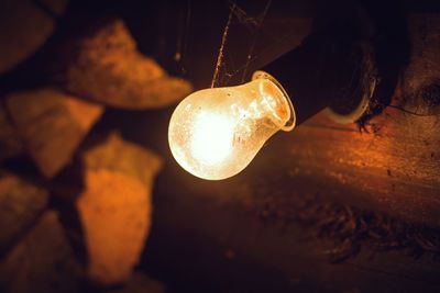 Close-up of illuminated light bulb