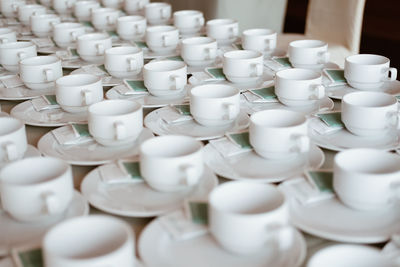 Empty coffee cup for wedding banquet conference seminar catering event. tea coffee break service