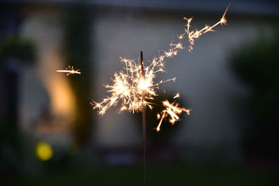 Close-up of firework display at night