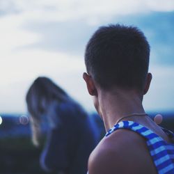 Close-up of man against sky