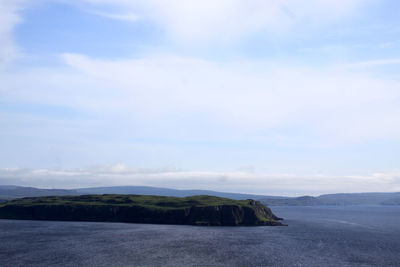 Scenic view of calm sea against sky