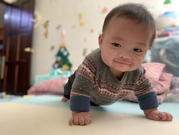 Portrait of cute baby at home