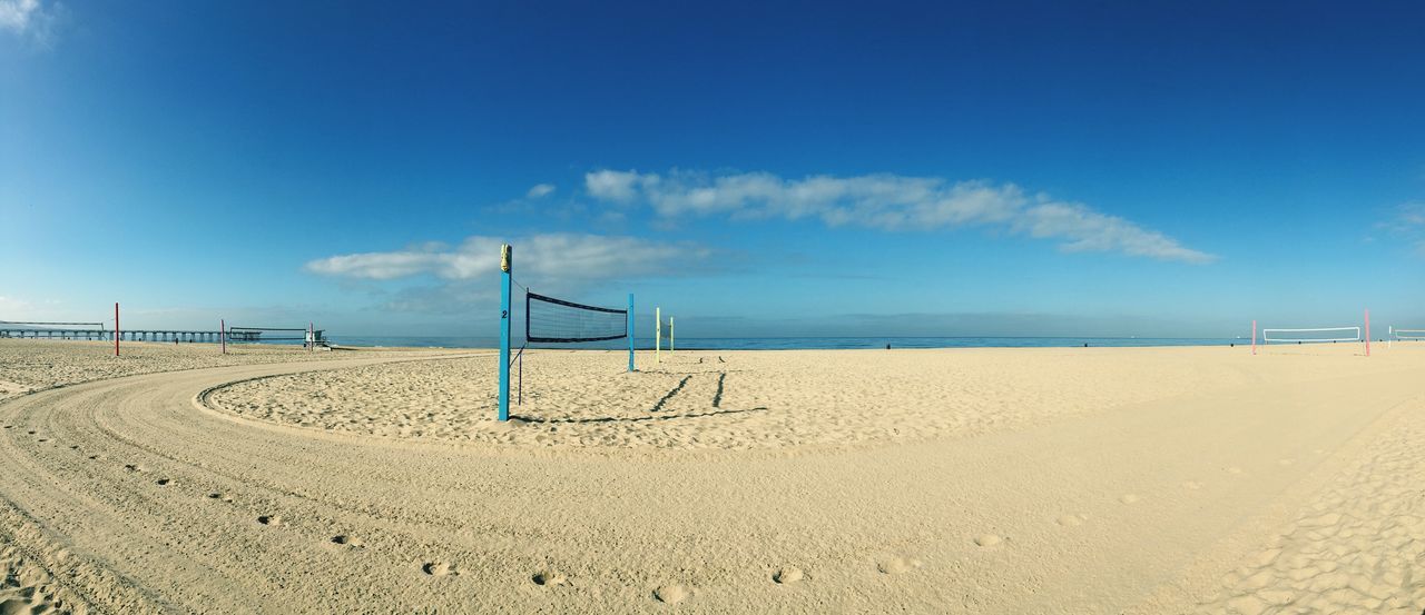 beach, sand, sea, shore, sky, horizon over water, blue, tranquility, tranquil scene, water, scenics, absence, nature, beauty in nature, day, sunlight, empty, cloud, incidental people, outdoors