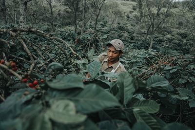 Portrait of man in forest