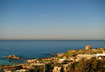 Scenic shot of sea against blue sky