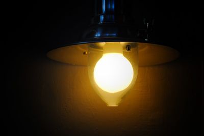 Close-up of illuminated light bulb