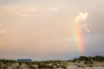 Scenic view of rainbow against sky