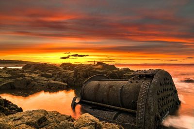 Wrecked boat on rocky shore