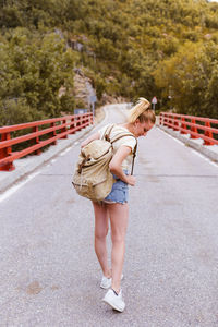 Rear view of woman on street