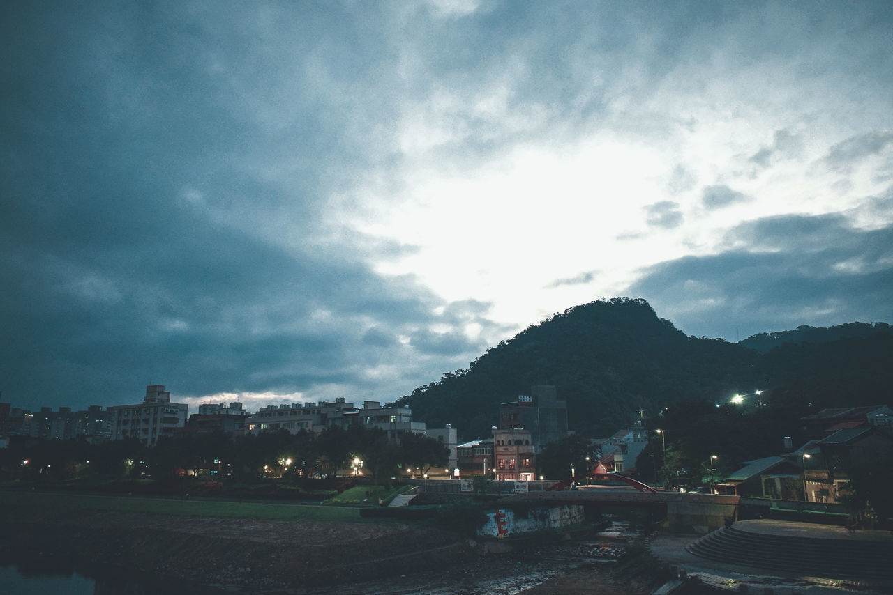 BUILDINGS IN CITY AGAINST SKY