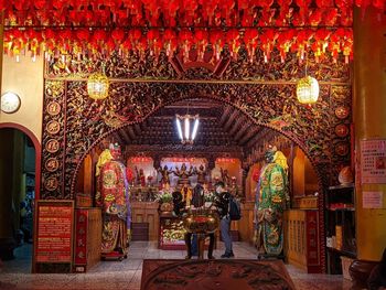 Illuminated lanterns hanging in temple