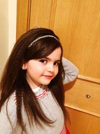Portrait of smiling girl at home