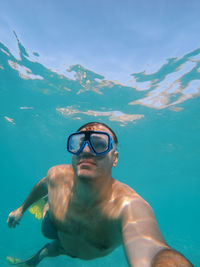 Man swimming in sea