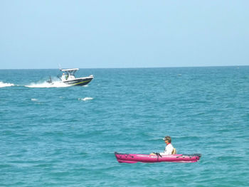 Boat sailing in sea