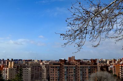 Buildings in city against sky