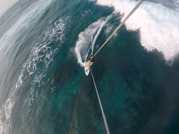 High angle view of person surfing in sea