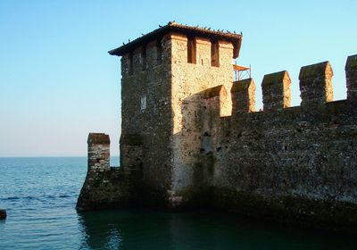 Low angle view of fort against clear sky