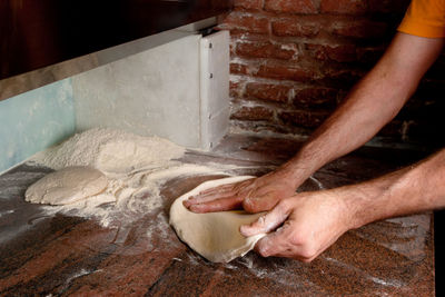 Midsection of person preparing food