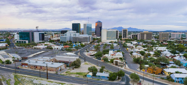 High angle view of buildings in city against sky