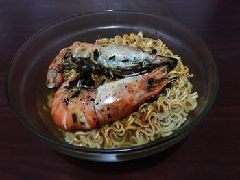 Close-up of noodles in bowl on table