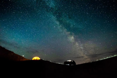 Scenic view of star field against sky at night