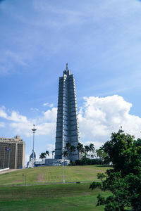 View of tower against cloudy sky