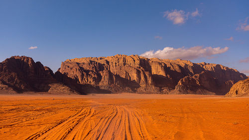 Scenic view of desert against sky